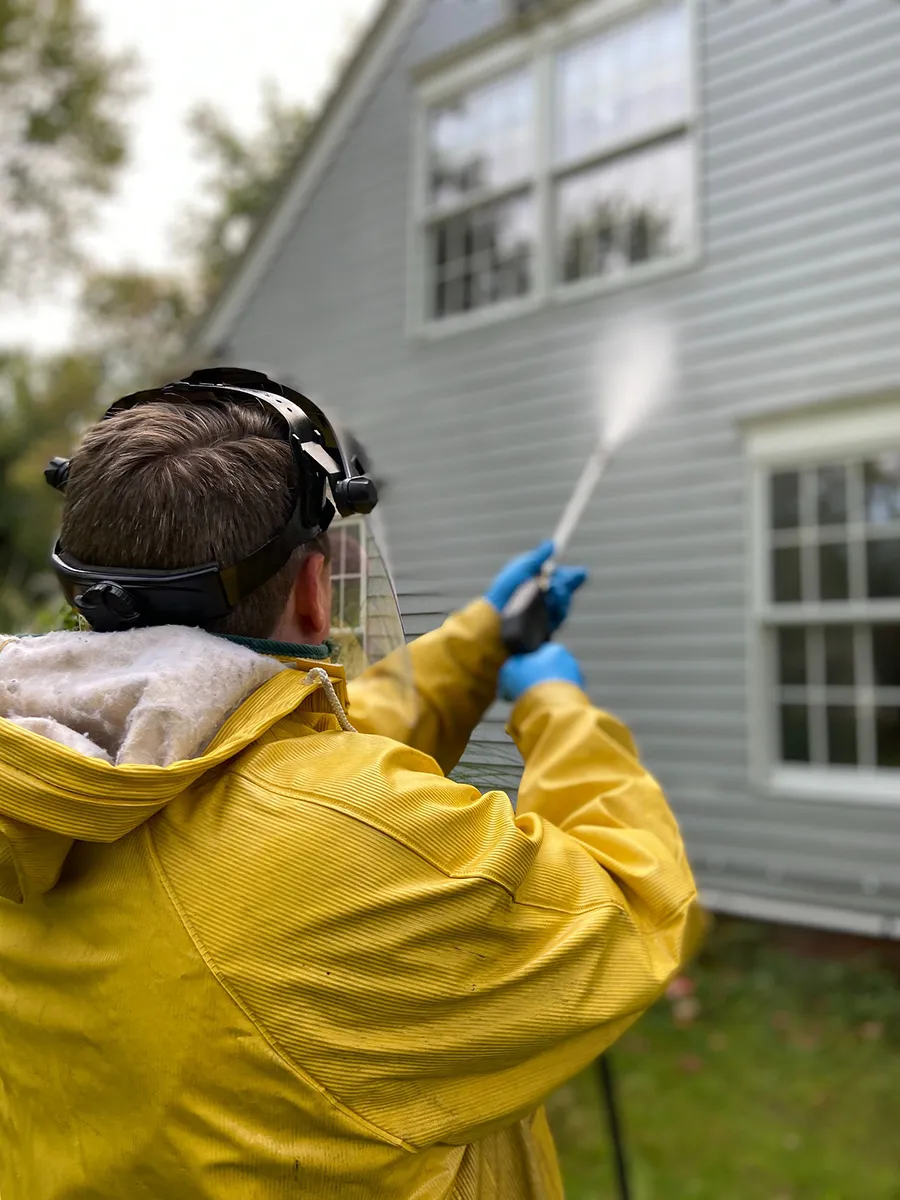 Pressure washing house siding